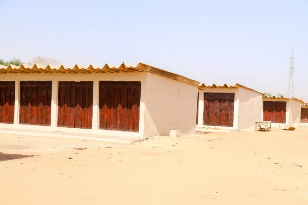 Bagudu distributes new shops to traders, promises to sustain economic activities