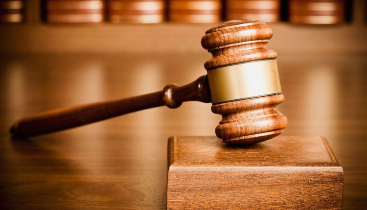 Housewife docked for allegedly threatening to kill preacher