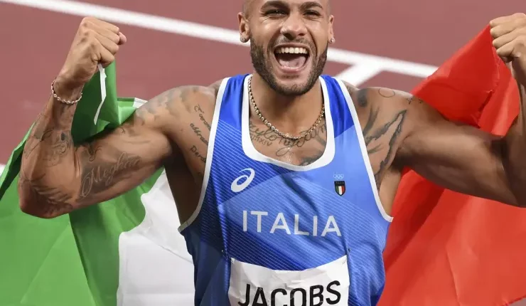 Olympic sprint champion wins 60m title at world indoor championships 