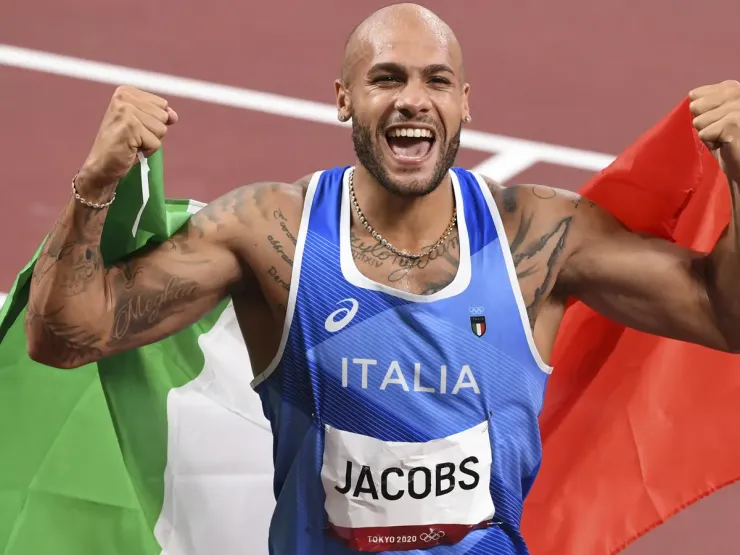 Olympic sprint champion wins 60m title at world indoor championships 