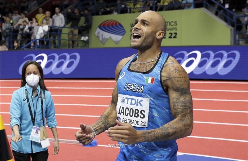 Olympic sprint champion wins 60m title at world indoor championships 