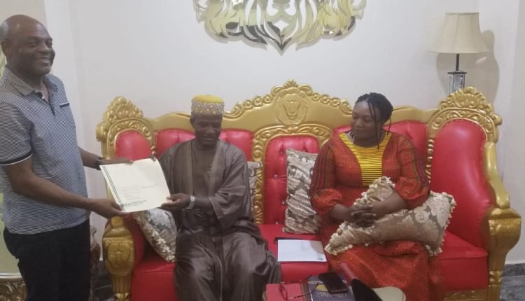 PRESIDENT BUHARI PRESENTS APPOINTMENT LETTER TO OCH'IDOMA.