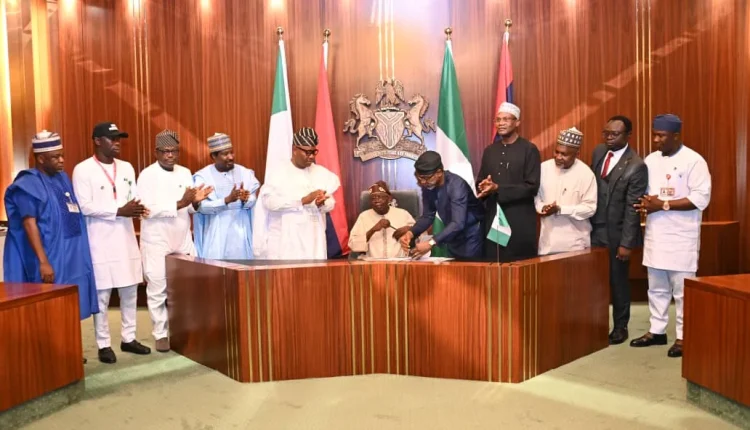 BREAKING: Tinubu signs student loan bill into law