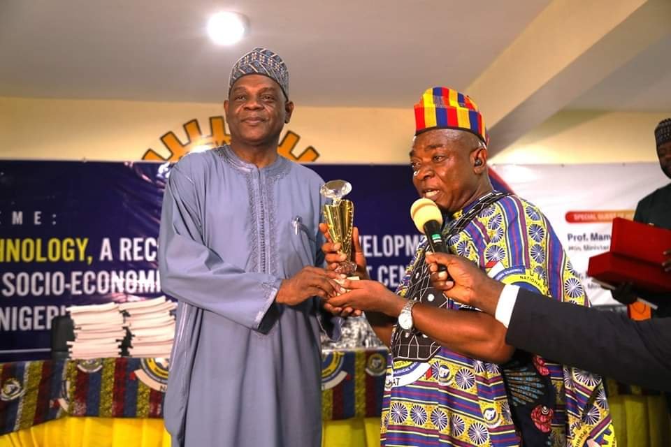 The Executive Secretary, TETFund, Arc. Sonny Echono (left) received an Award of Excellence from President National Association of Academic Technologists (NAAT), Comrade Ibeji Nwokoma during the 5th National Delegates Conference of NAAT at the University of Abuja.