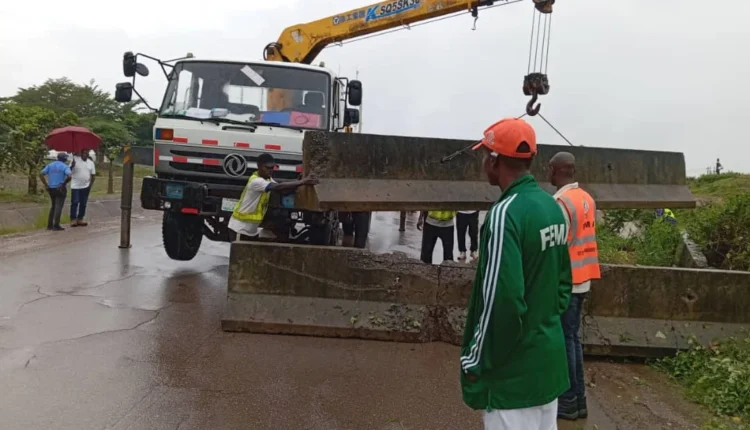 FCT emergency department barricades flood-prone slip road in Abuja
